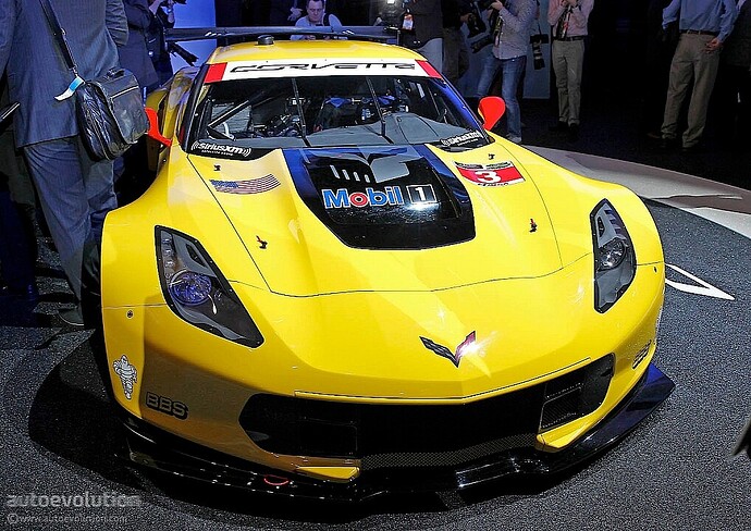 http://s1.cdn.autoevolution.com/images/news/gallery/720/2014-corvette-c7r-breaks-cover-in-detroit-promises-more-track-success-live-photos-720p-7.jpg?1389631902