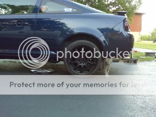 http://i268.photobucket.com/albums/jj1/teamhavoc87/rimspaintedblack.jpg