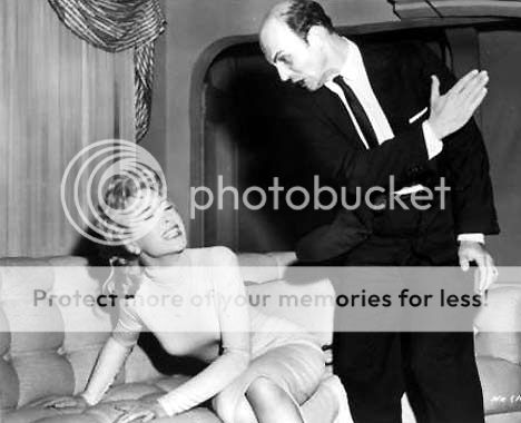 http://i55.photobucket.com/albums/g156/91MR2_photos/SlappingBarbaraEden_zpsd97373f7.jpg