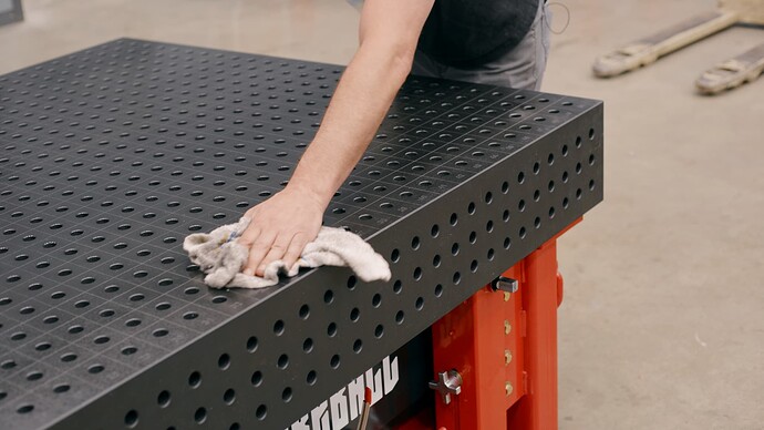 The best way to clean the Fireball Rental Table is to use WD-40 and a rag to wipe it down.