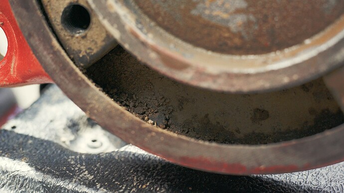 Inside The Swivel Base Covered In Dirt