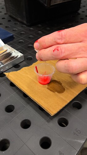 Pouring Mineral Spirits Into The Cup Of Paint