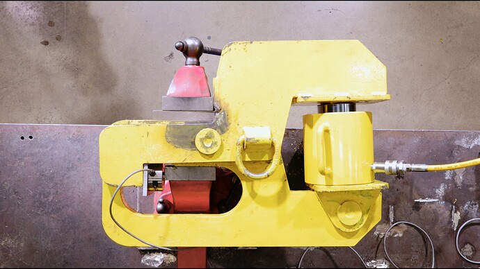 Fireball 510 Hardtail Vise placed in a hydraulic machine built to break vises